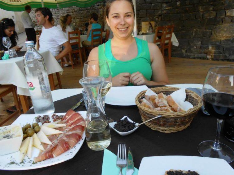 Prosciuttos, cheeses (yes, even a truffle-specked specialty), fresh bread, truffle tapenade, and a glass of Teran. Can I go back to Motovun Croatia?