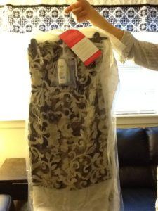 My dress came with freebies: a garment bag (not pictured), fashion tape, and body wash.