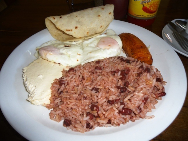 A Nicaraguan breakfast of eggs, gallo pinto (rice and beans), cheese, ripe plantain, and torilla - for C$50 or about US$2