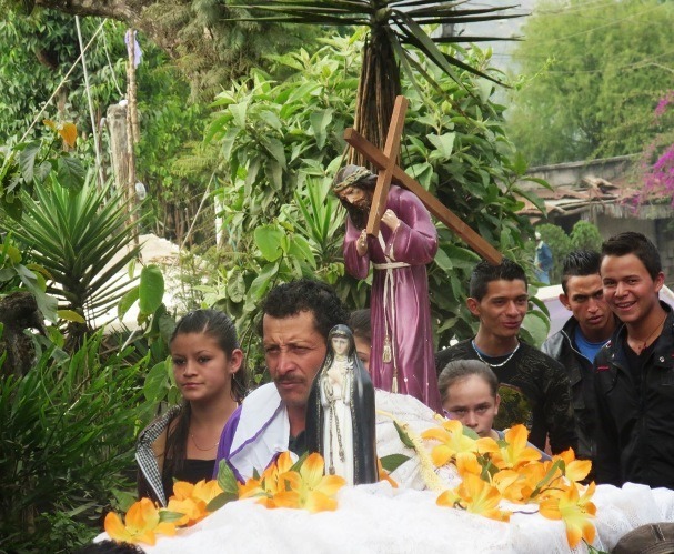 A small Semana Santa Procession in the village of San Vicente Pacaya