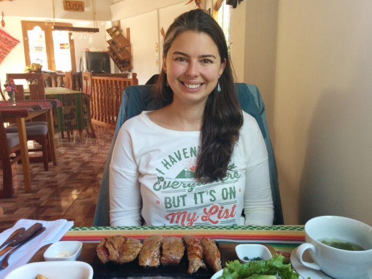 girl eating at restaurant in sacred valley