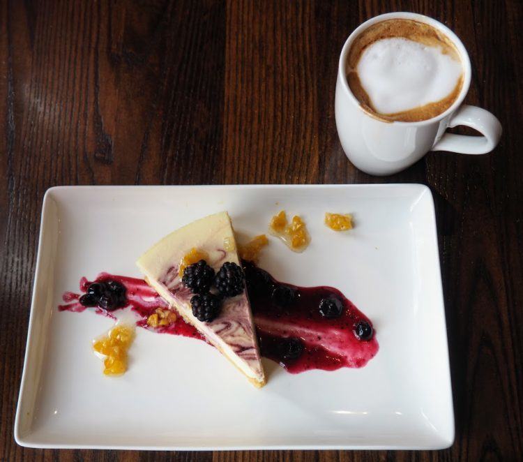 A goat cheese cheesecake, with local berries and sweet corn at Red Stag Grill the best asheville restaurants