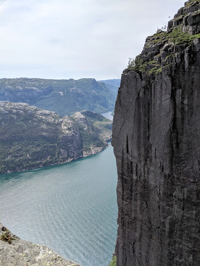 Steep walls rising over the Lysefjord at pulpit rock