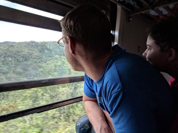 looking out the window of a sri lanka train