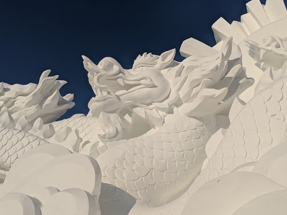 dragon snow sculpture on sun island harbin