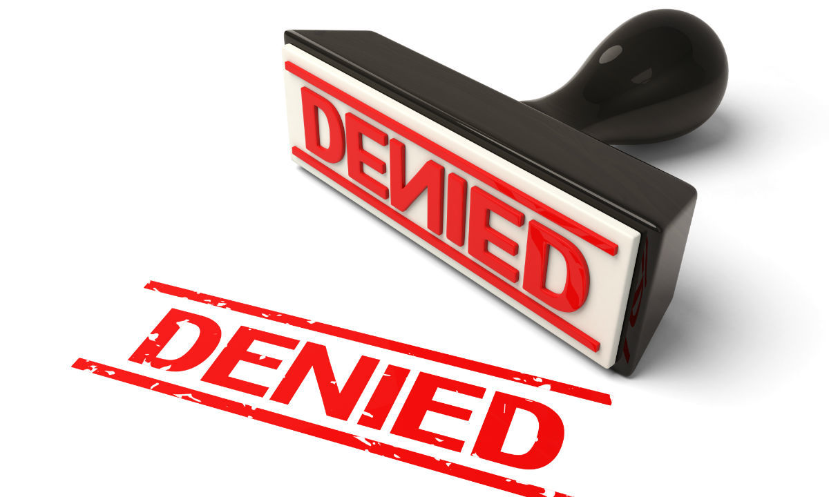 travel insurance denied stamp