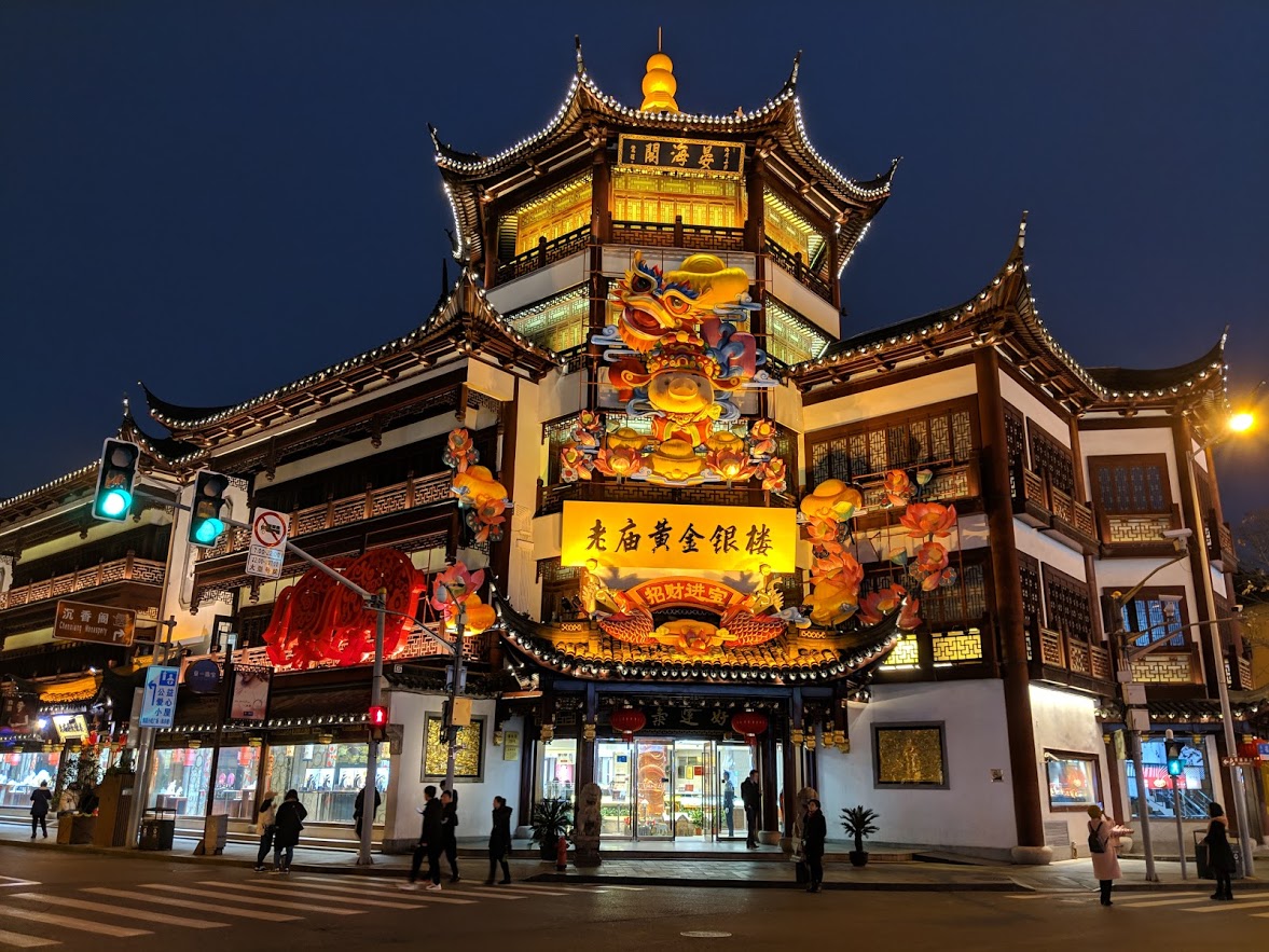 pagoda building lit at night in shanghai