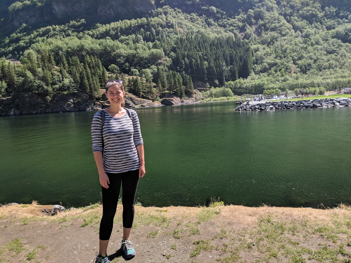 girl wearing simple shirt and black pants in norway
