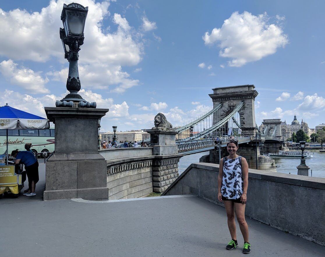 girl in front of budapest bridge