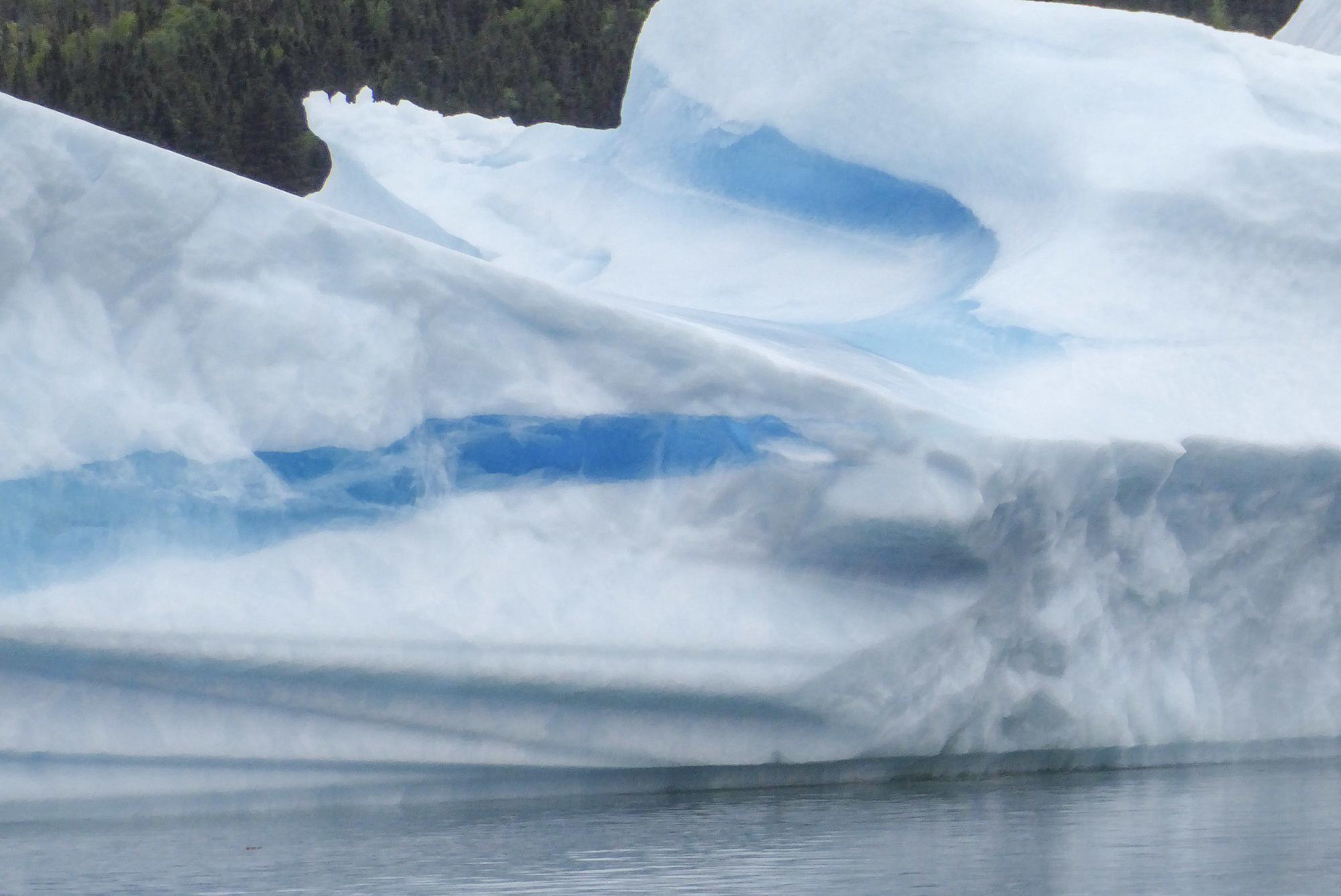 close up of blue ice on iceberg