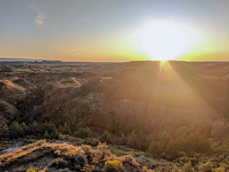 bright sunrise and sunburst in the north dakota national park