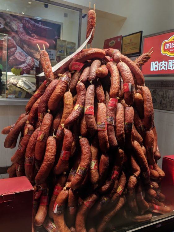 pile of red sausages in a harbin store