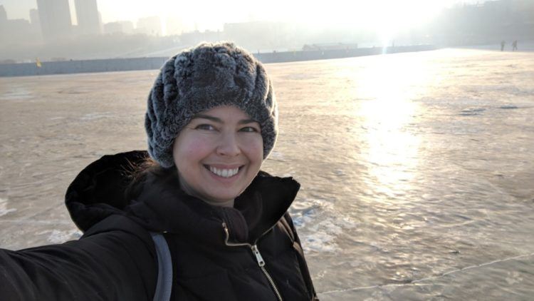 becky in front of harbin skyline