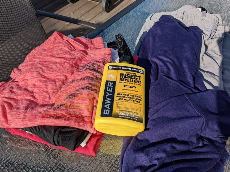 permethrin spray on safari clothes