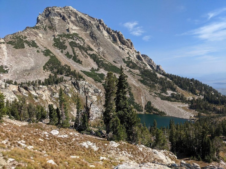 overlooking blue lake in mountains