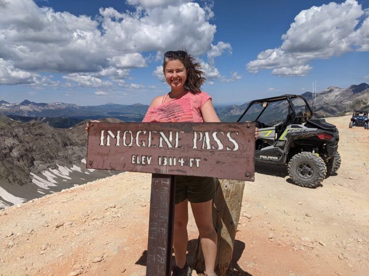 standing on top of imogene pass