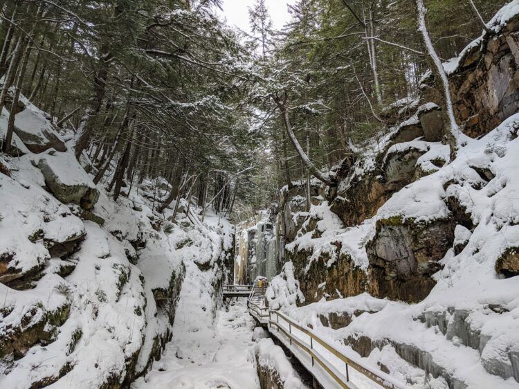 snowy boardwalks at flume gorge in winter