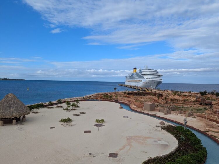 cruise ship docked off in the distance at Cabo Rojo Dominican republic